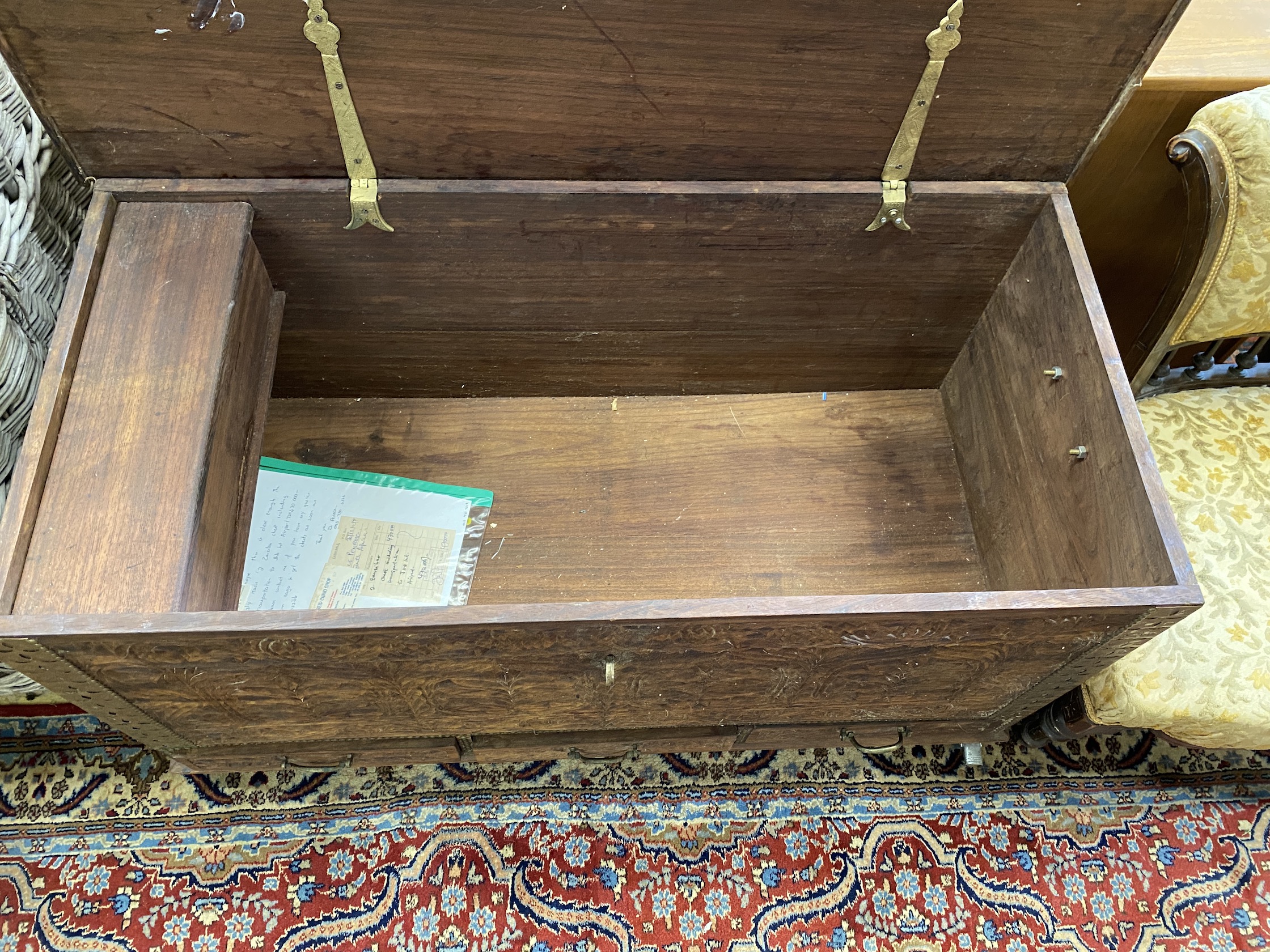 A brass mounted carved hardwood Zanzibar chest, width 110cm, depth 54cm, height 61cm